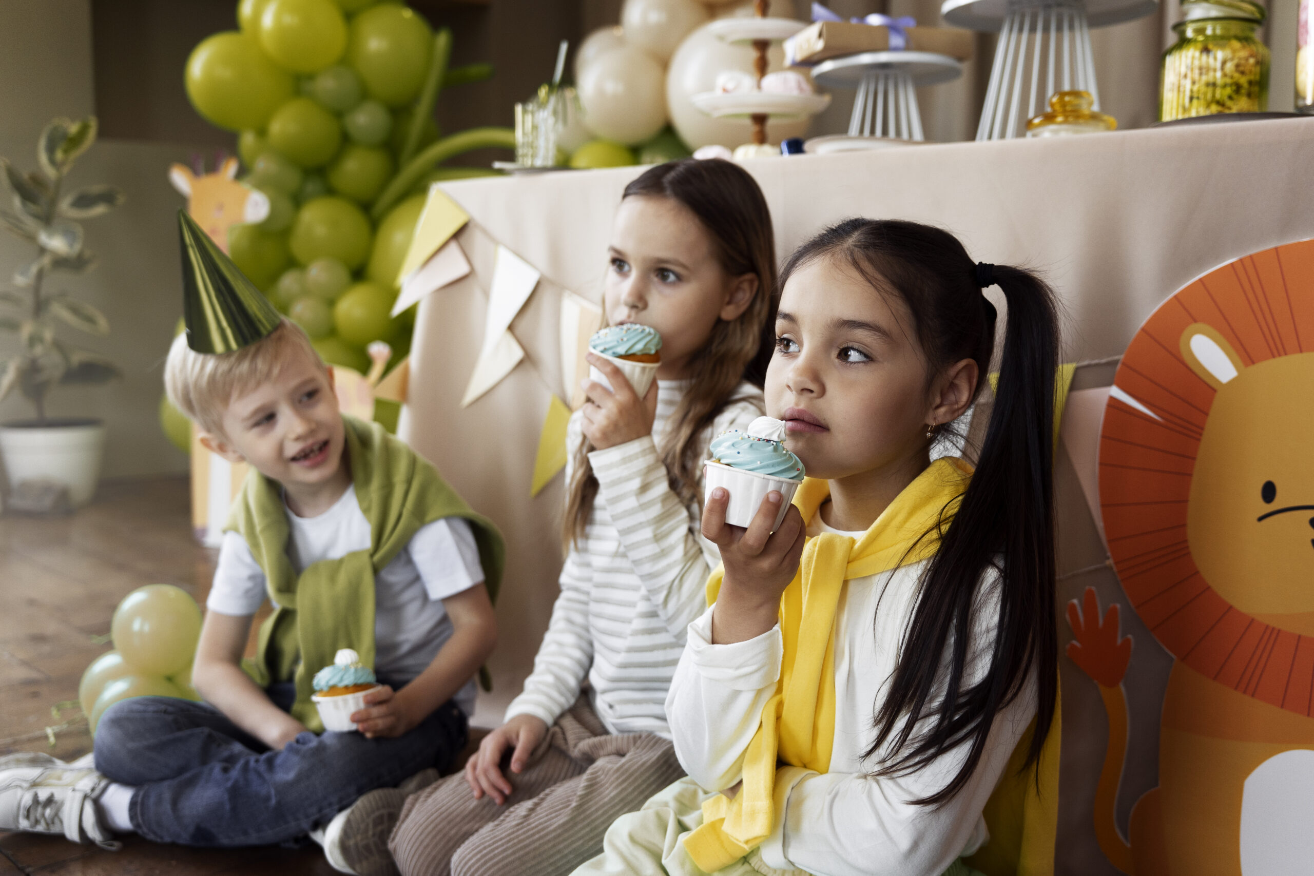 side-view-kids-eating-cupcakes